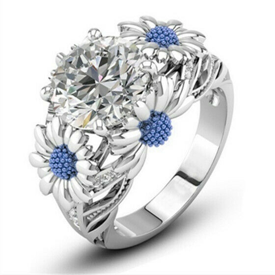 Round White Sapphire Center + Light Blue Daisy Charms Ring
