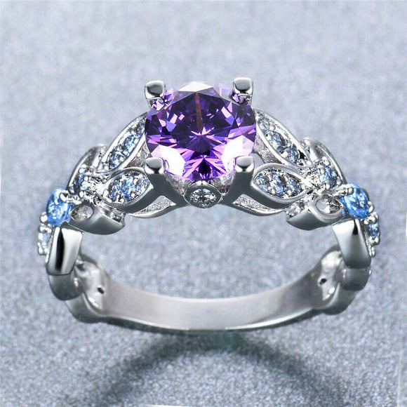Purple Amethyst Center Stone + Light Blue Flower Band Siding Ring
