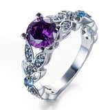 Purple Amethyst Center Stone + Light Blue Flower Band Siding Ring